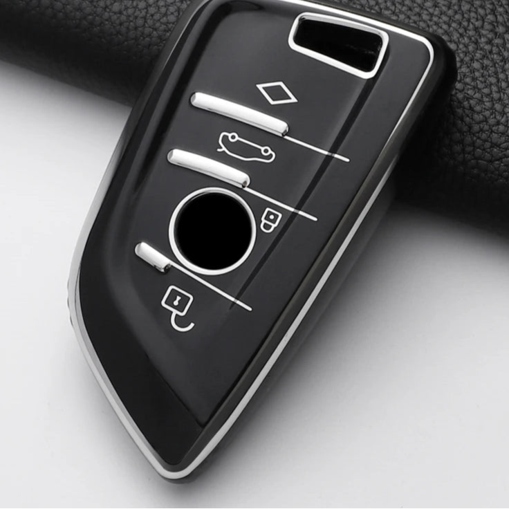 Car key fob cover with control icons on a gray background